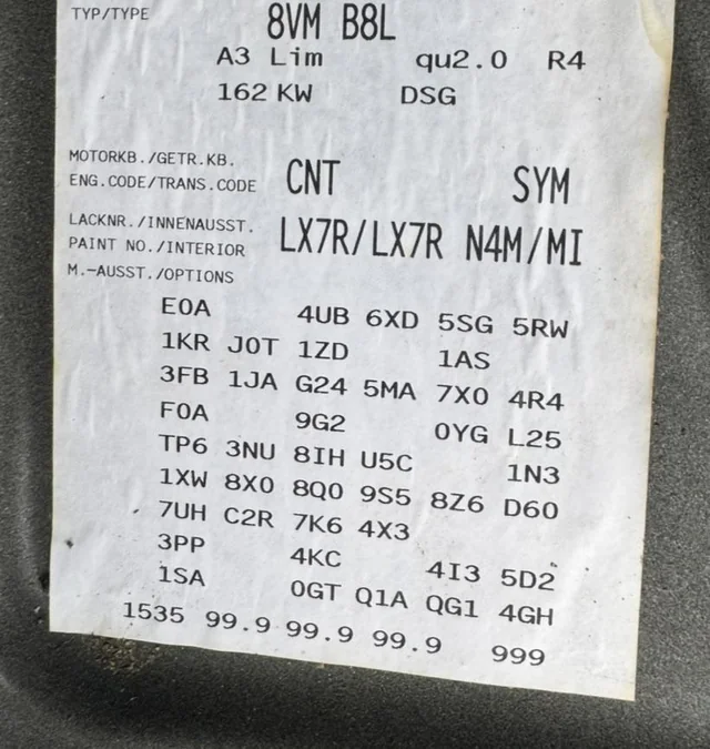 Audi vehicle data sticker from an A3, with the paint code LX7R on the PAINT NO./INTERIOR line