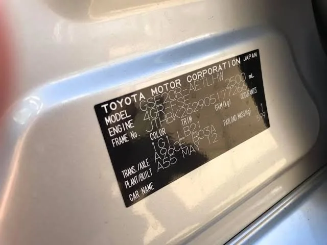 Toyota identification plate with the paint code 1G1 under COLOR in the COLOR/TRIM section